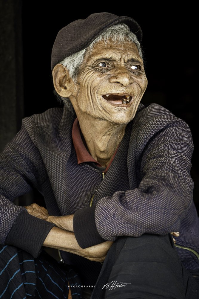 Portrait of Indonesian man laughing in Flores