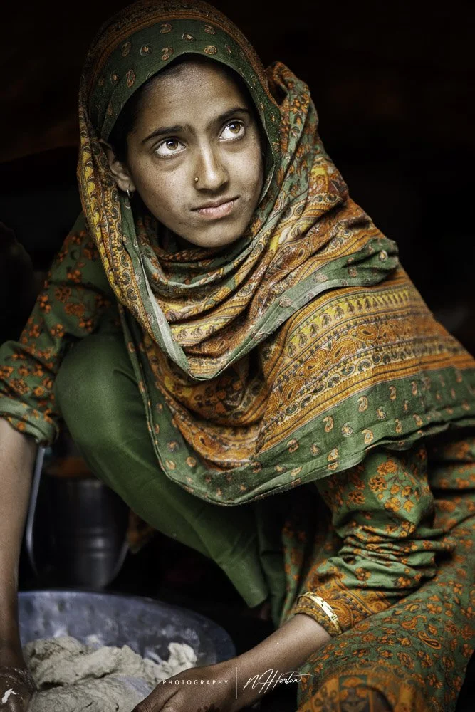 Kashmir portrait of lady washing dishes