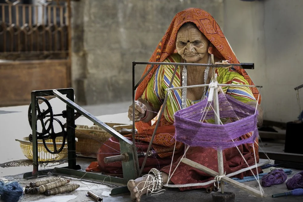 Nomadic goat herder on the road in Kashmir, India.