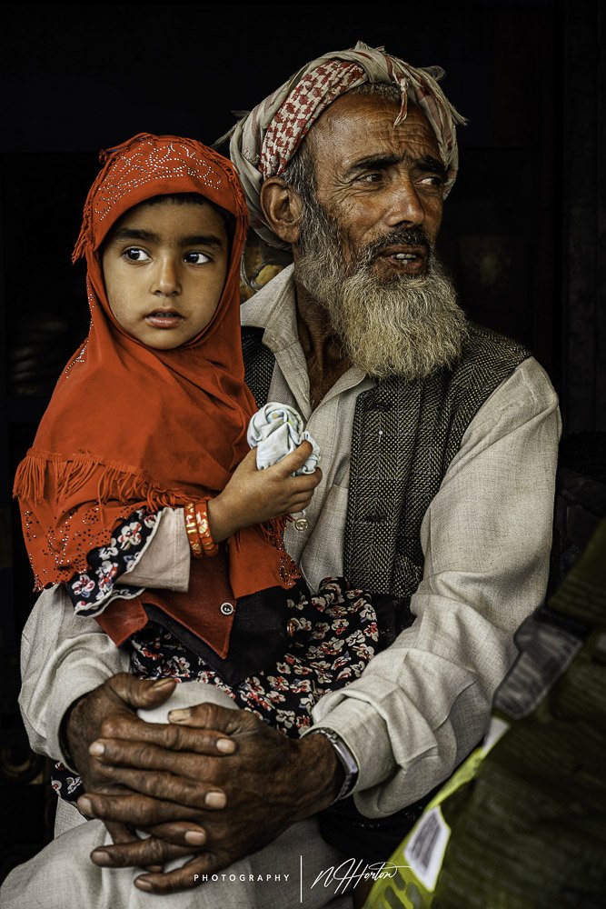 Kashmir grandfather and granddaughter