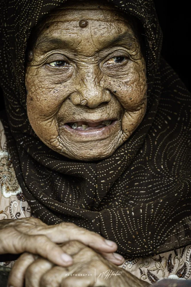 Portrait of old lady in Indonesia