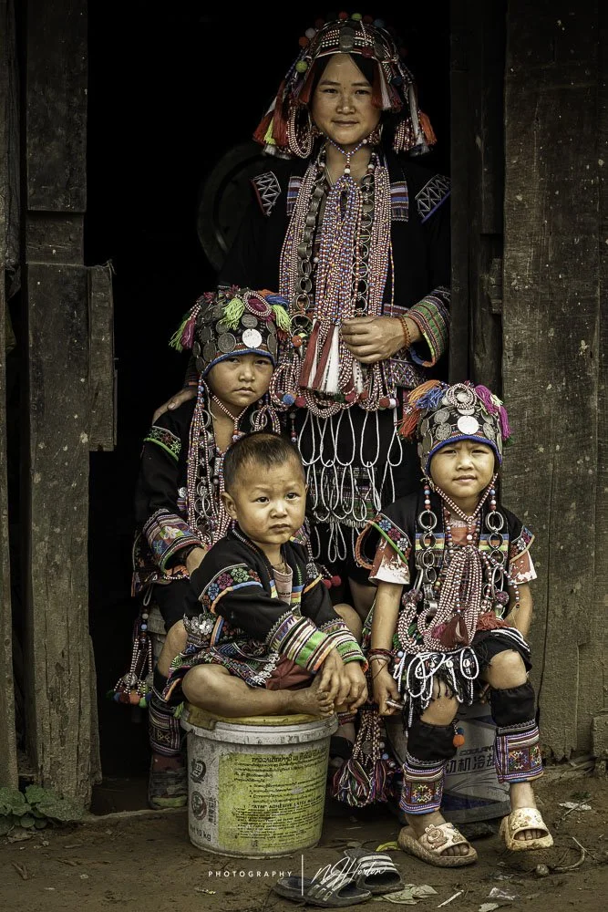 Portrait of Akha hill-tribe family  in Laos