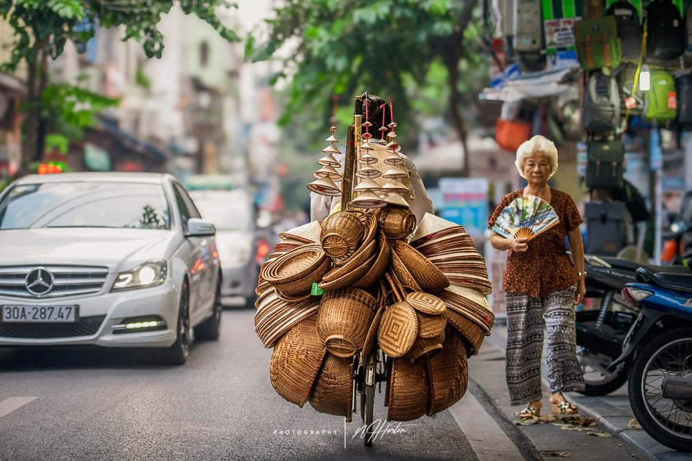 Busy, chaotic, contrasting streets of Hanoi, North Vietnam.