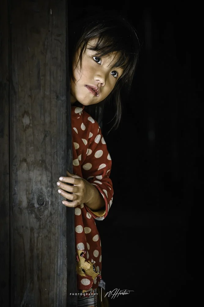 Young Girl in doorway North Vietnam