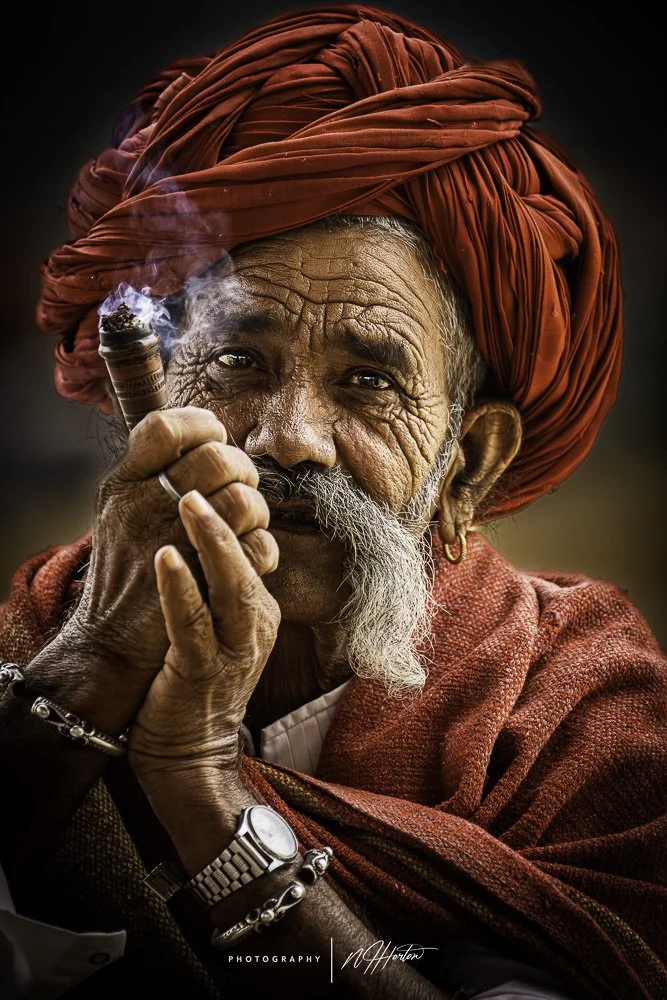 Portrait-of-herder-smoking-Chilum-pushkar-camel-fair-Rajasthan.jpg