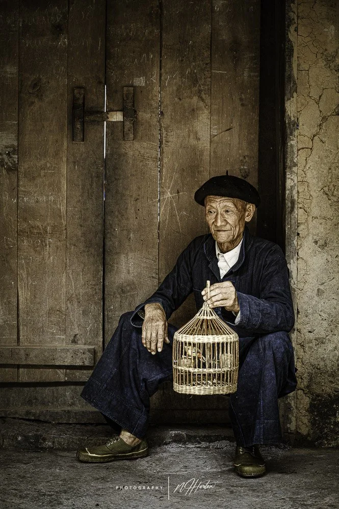 Old man in doorway North Vietnam