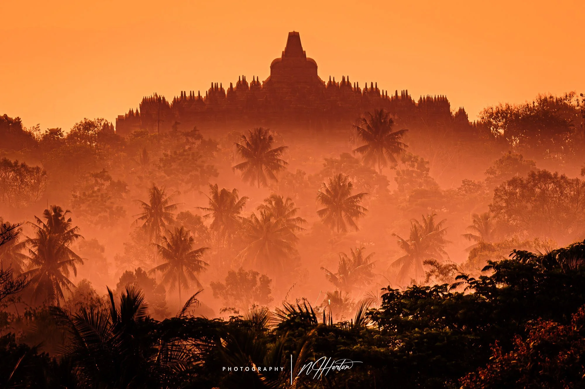 Silhouette of Borobudur temple at sunrise, Java, Indonesia