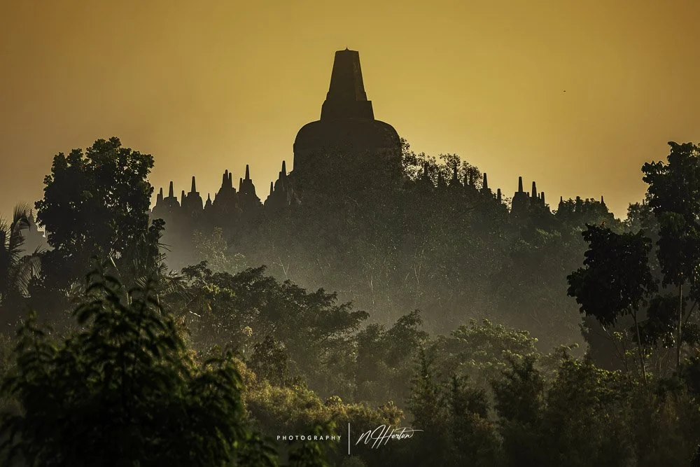 Silhouette of Borobudur Temple at Sunrise, Java, Indonesia.