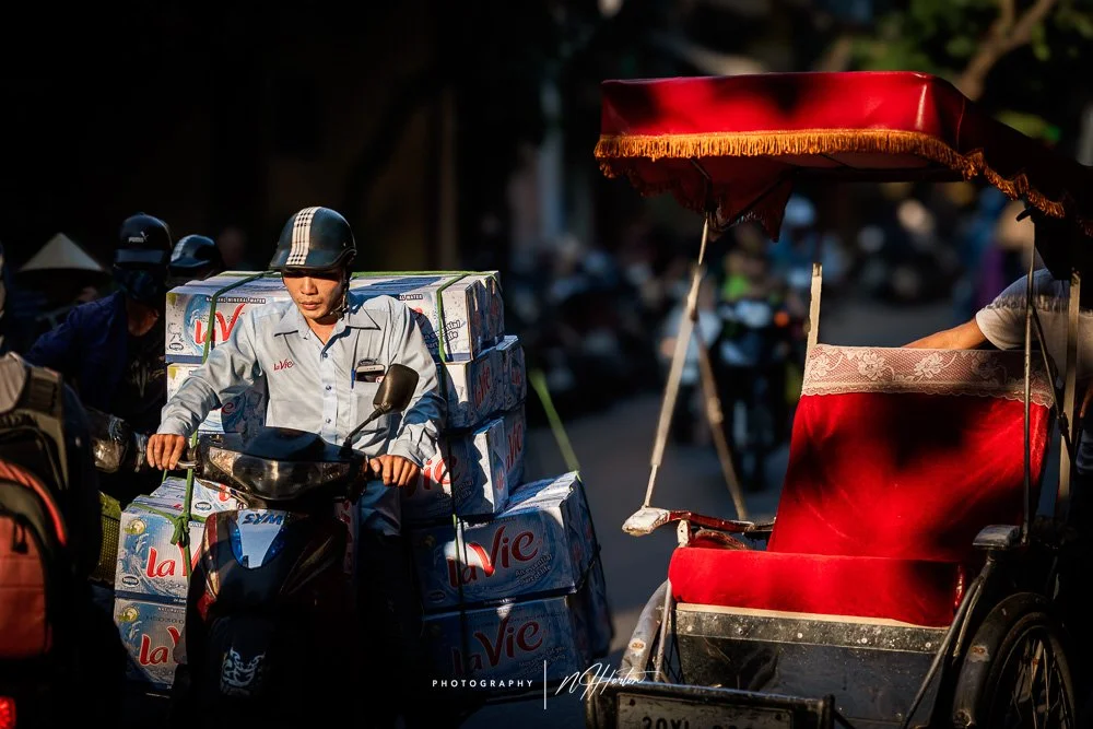 Typical afternoon street scene, Hanoi, North Vietnam.
