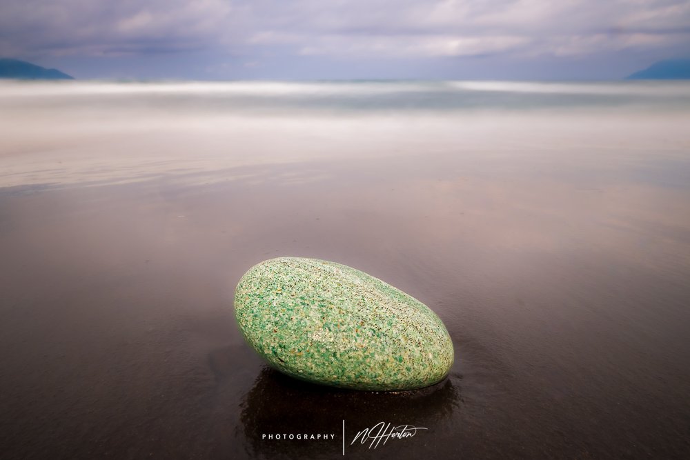 Blue stone on beach in Flores, Indonesia