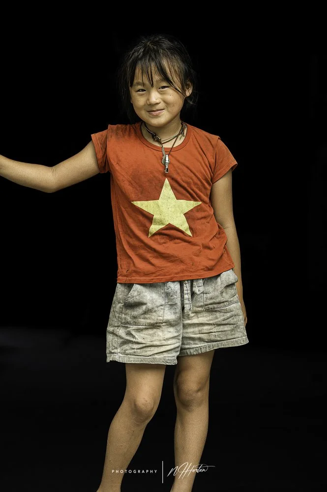 Young Girl with Vietnam star T-Shirt North Vietnam