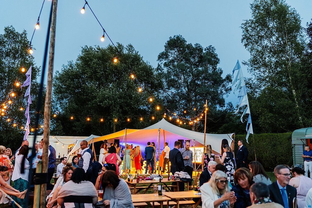 Night Time Glow | You can never have too much lighting at a marquee wedding! 

Here at The Lakeside we provide a pretty and practical combination of festoons and fairy lights as standard, but if you want to go the extra mile and really light up your 