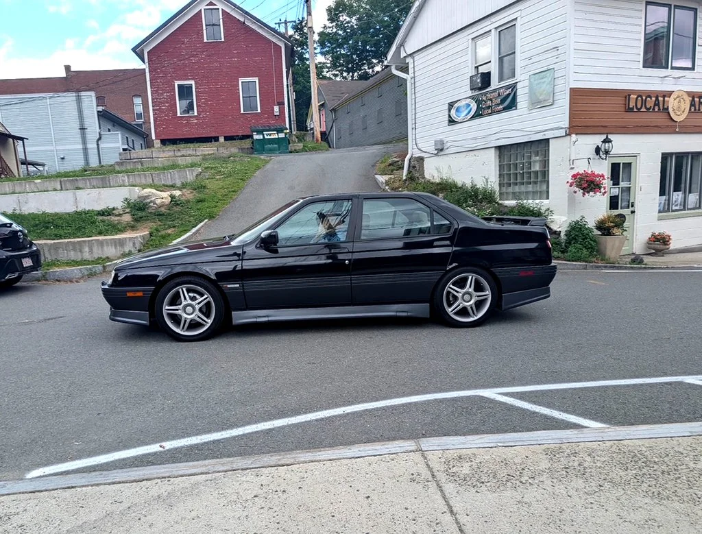 Our cars, in sequence, starting out on our tour