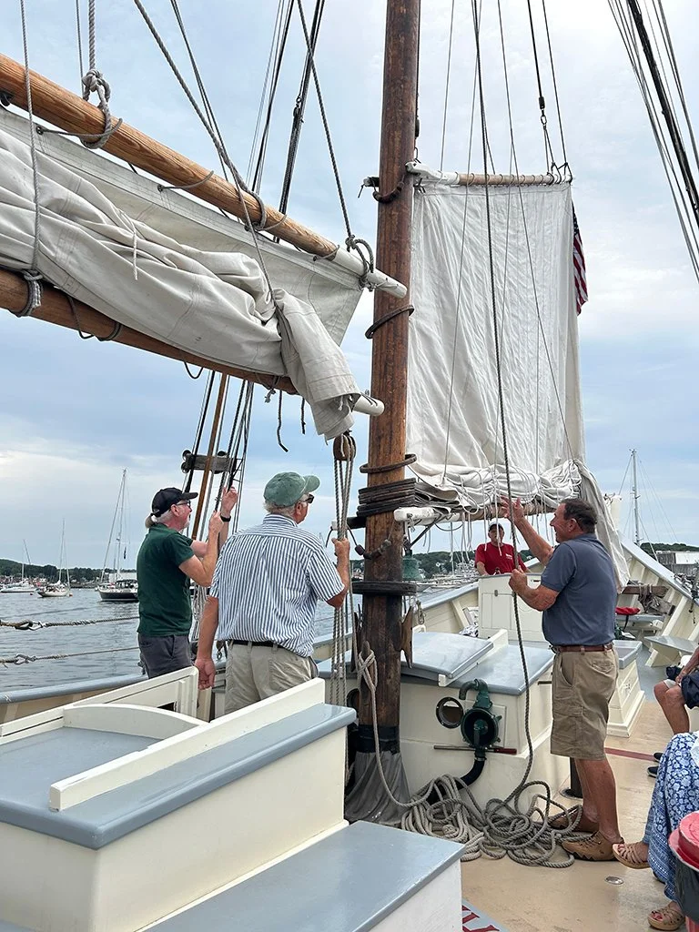 Preparing to raise the mainsail