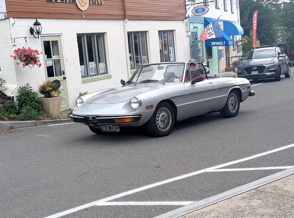Our cars, in sequence, starting out on our tour