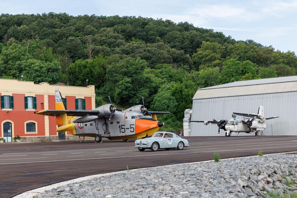 The Italian Air Force (celebrating its 100th anniversary) forms part of the background for the Mille Miglia
