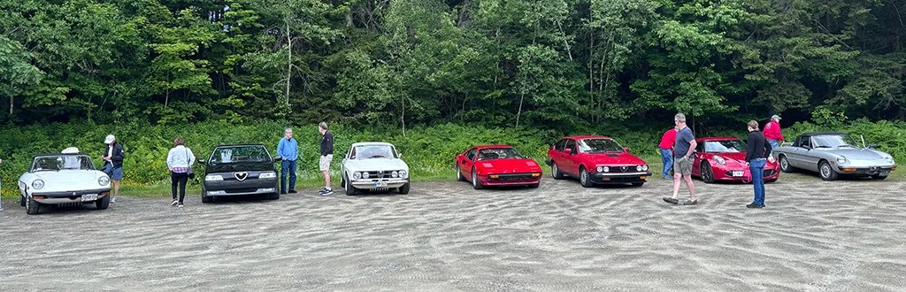 Our cars take over the parking lot at Trail 87