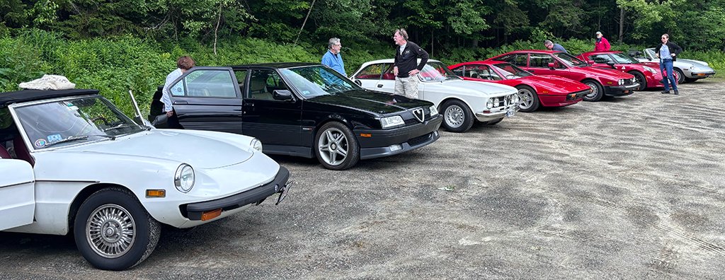 Our cars take over the parking lot at Trail 87
