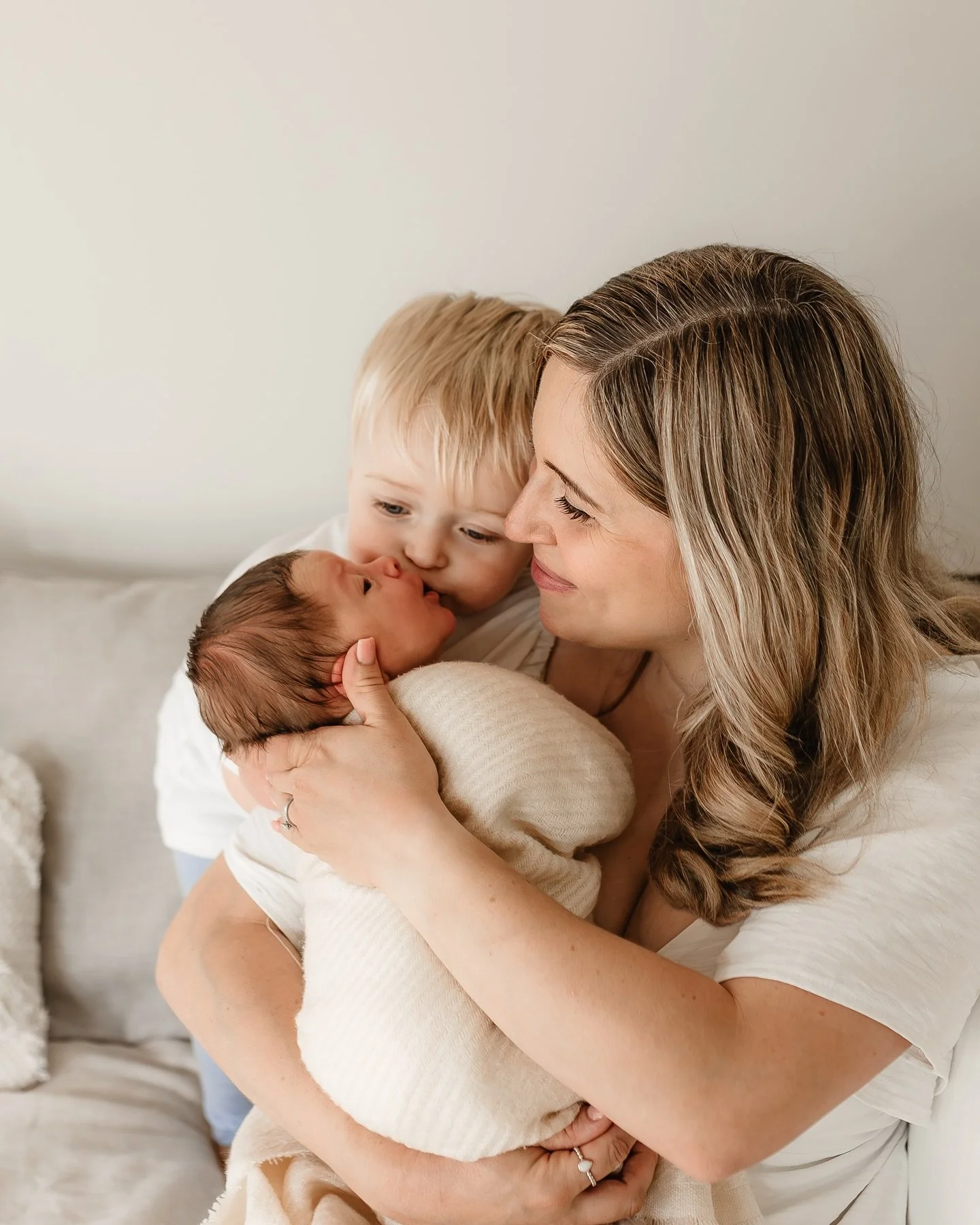 I've had the privilege of watching this lovely family grow!, I love when returning clients come back with new additions - capturing the special bond between siblings is always a highlight!, It's moments like these that make my job so rewarding!