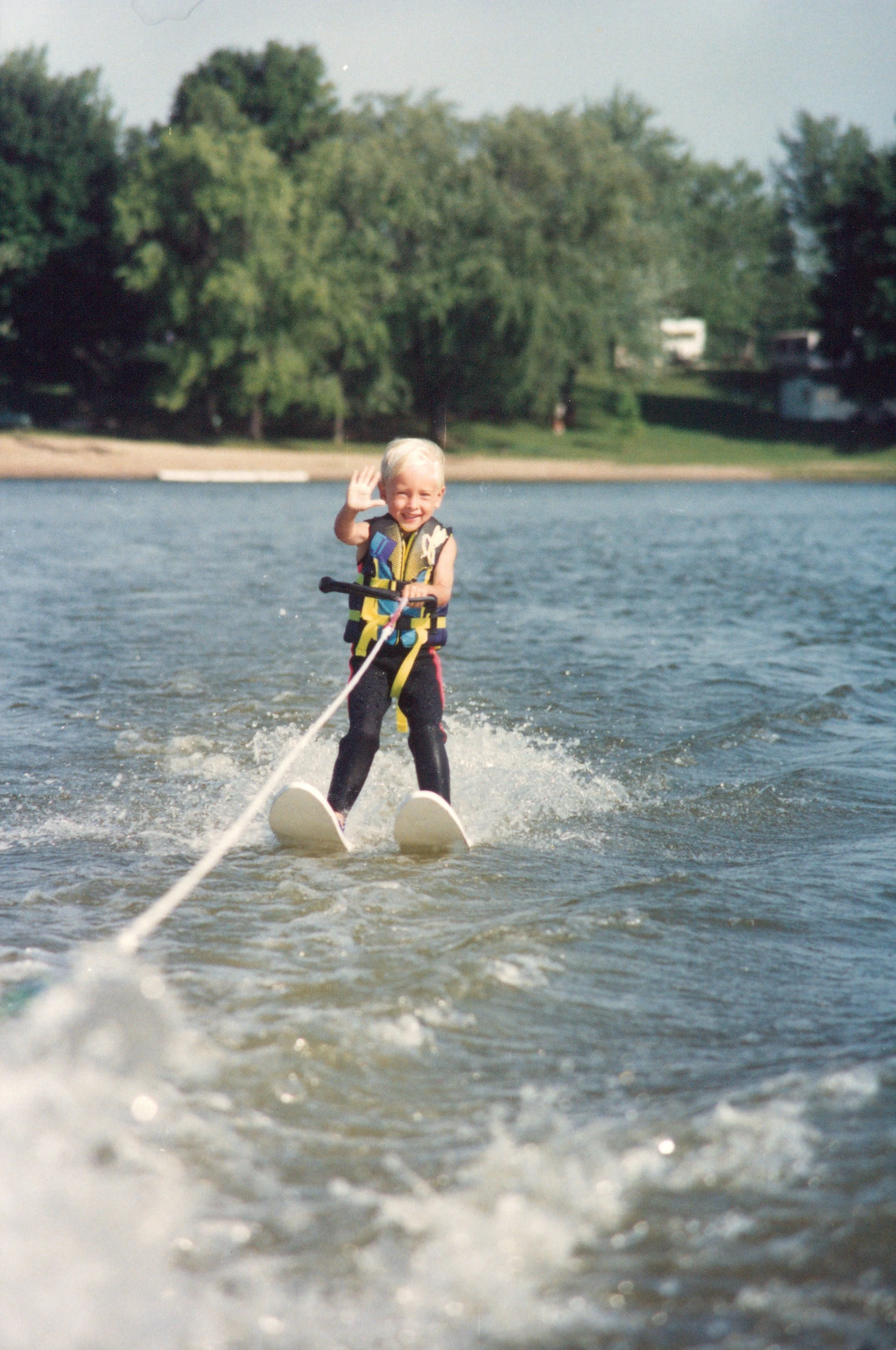 Jason McClintock cruising by Barbers Beach (now known as Irish Creek) on Puslinch Lake