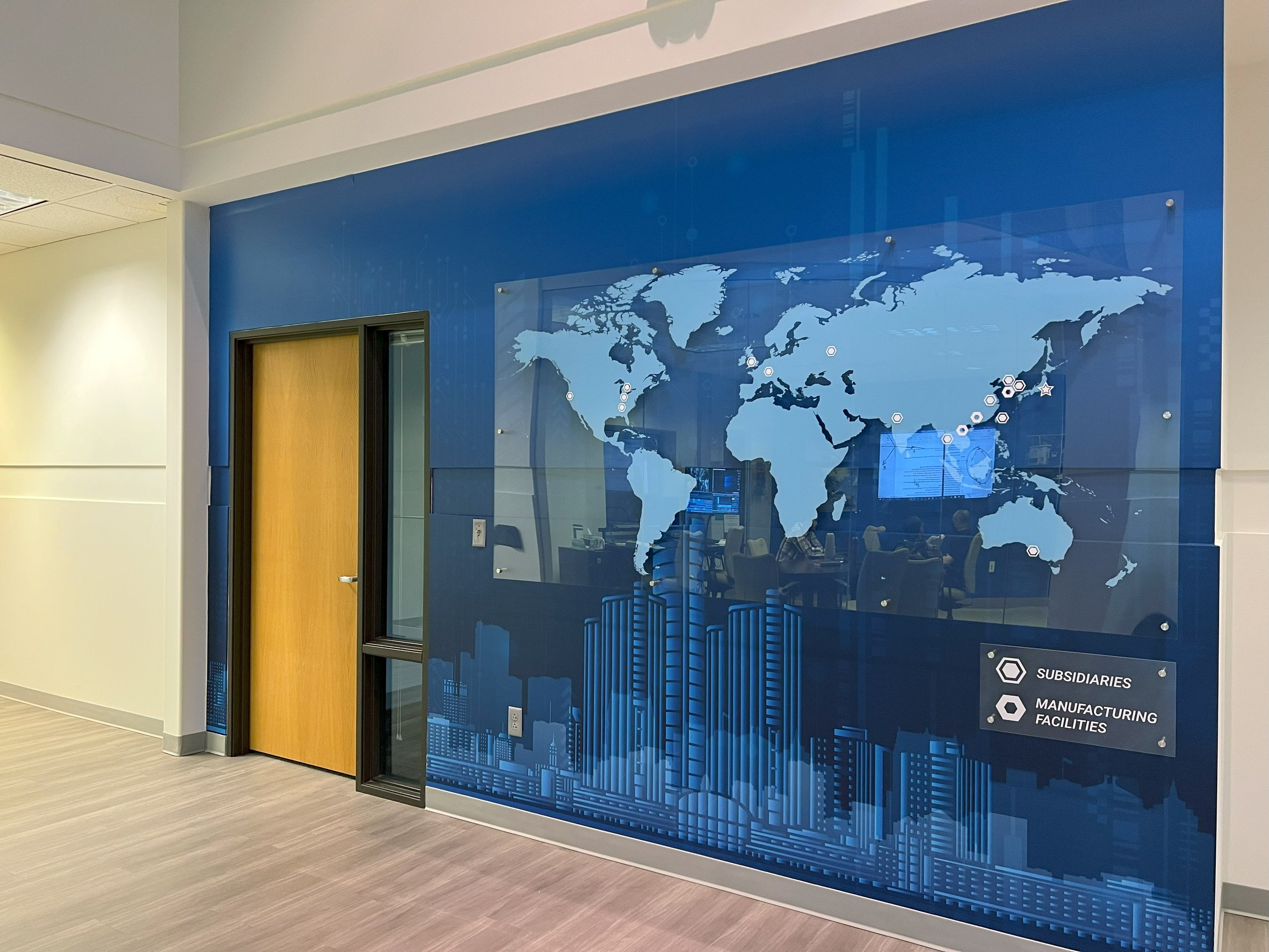 Final installation photo of the map wall.