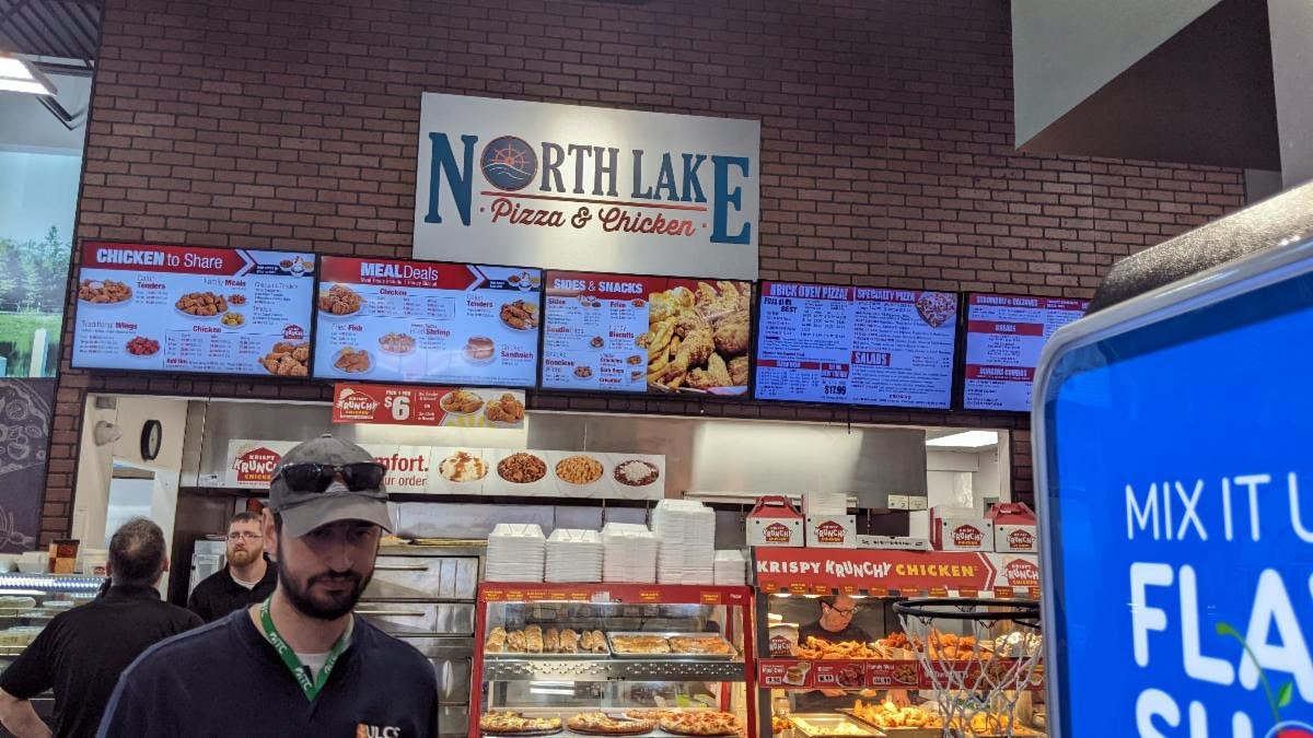 Final installation photo of the dimensional sign.