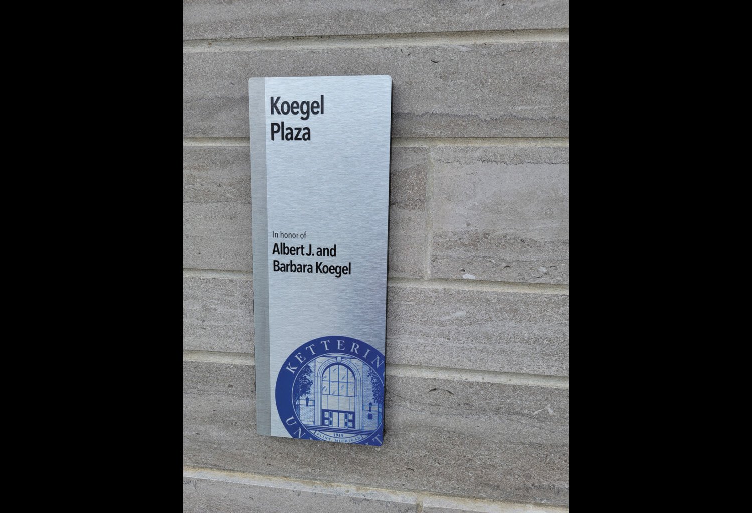 Final installation photo of one of the space dedication plaques I designed.