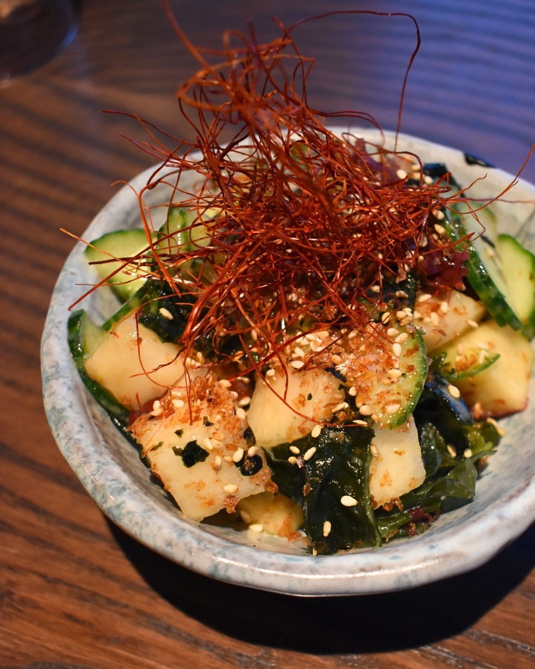 NEW on the menu!🚨 Dive into our vibrant tri-colored seaweed salad with sunflower seed tahini, crisp cucumbers, sweet Asian pears, all tossed in zesty yuzu vinaigrette, finished with toasted sesame seeds &amp; a pop of chili threads. 🔥✨ Fresh, color