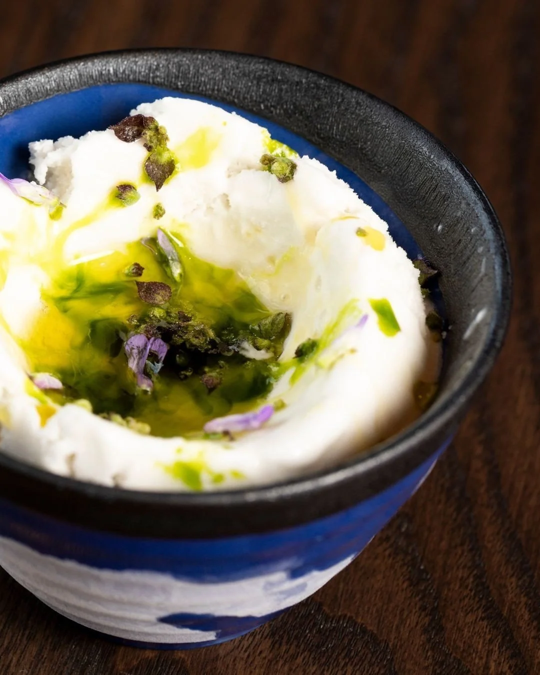 Cool, fragrant, and unexpectedly bold: coconut milk sorbet infused with lemongrass &amp; ginger, layered with Thai basil oil and edible blossoms. 🌿 

Reserve your table Wednesday-Sunday from 5:00-9:00PM.

📸: @heidikirn