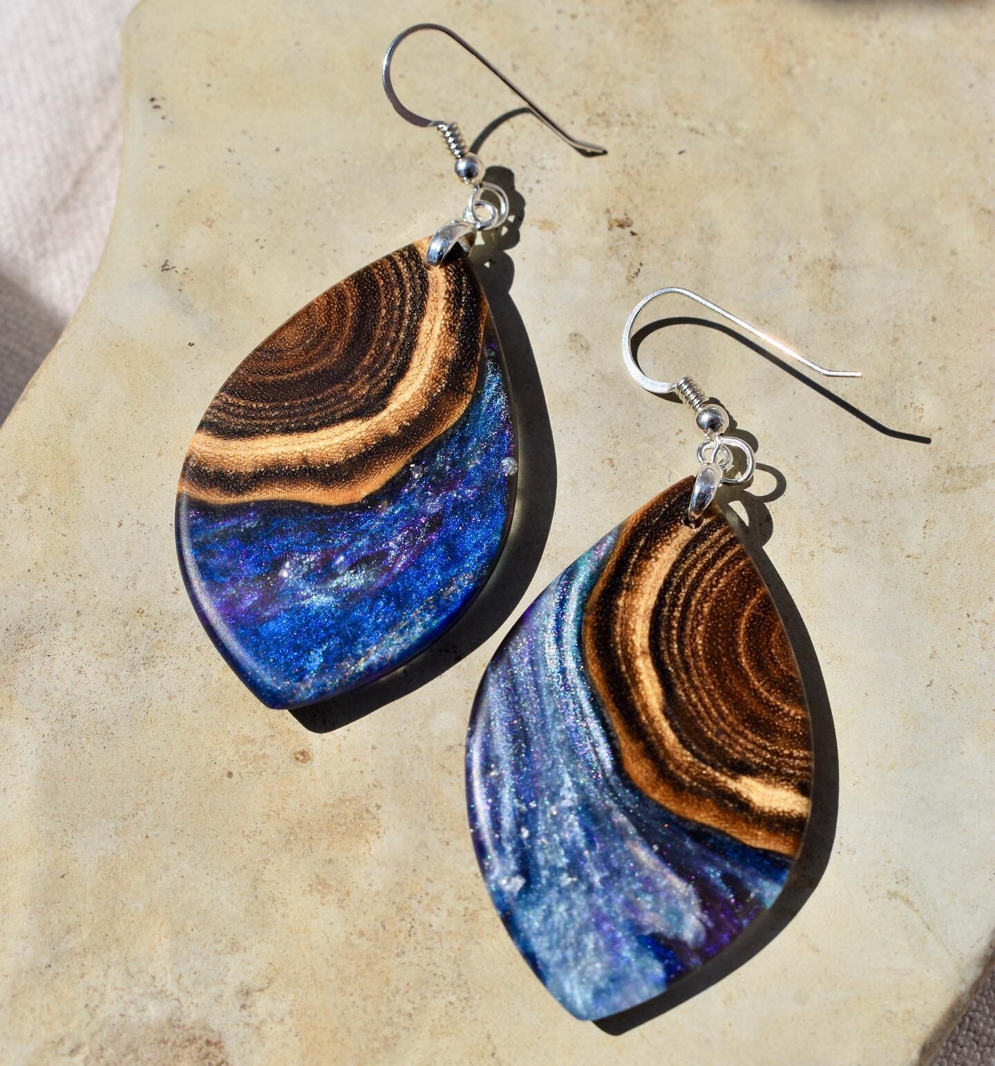 ✨Website Update ✨

Whether you have a love for astronomy or simply enjoy starry night skies, this galaxy-inspired series will satisfy your interest in outer space. The colors and depth of the cosmos are captured in each pair of earrings by combining 