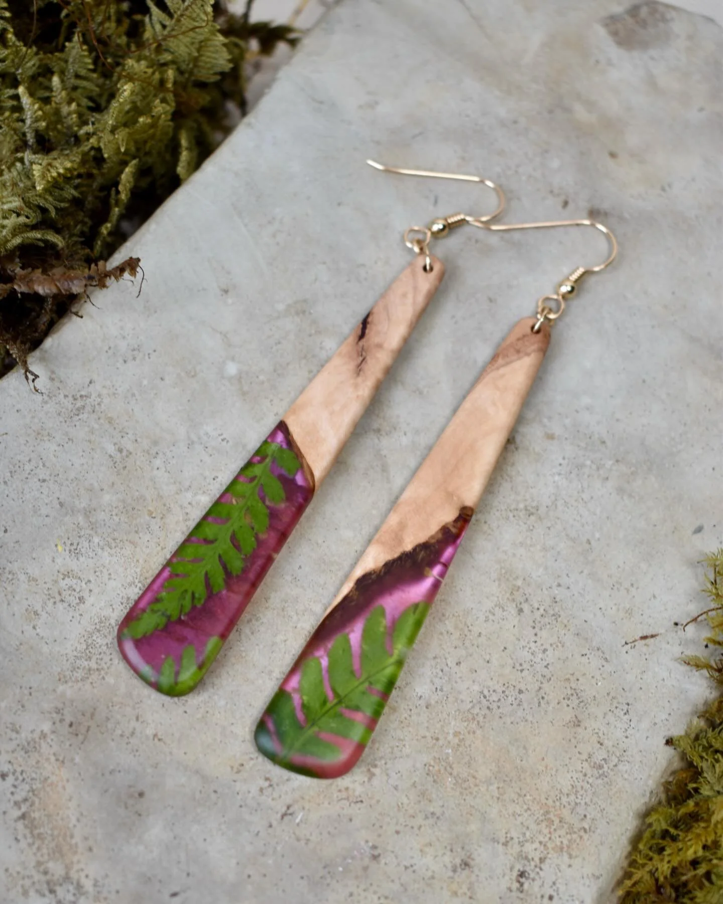 Bringing that 1992 rainforest energy to your lobes. First batch of Fern Gully earrings now available on the website 🦇🧚🪾

#silvaticadesigns #forestfriendlyfashion #ferns #clevelandartist #woodjewelry