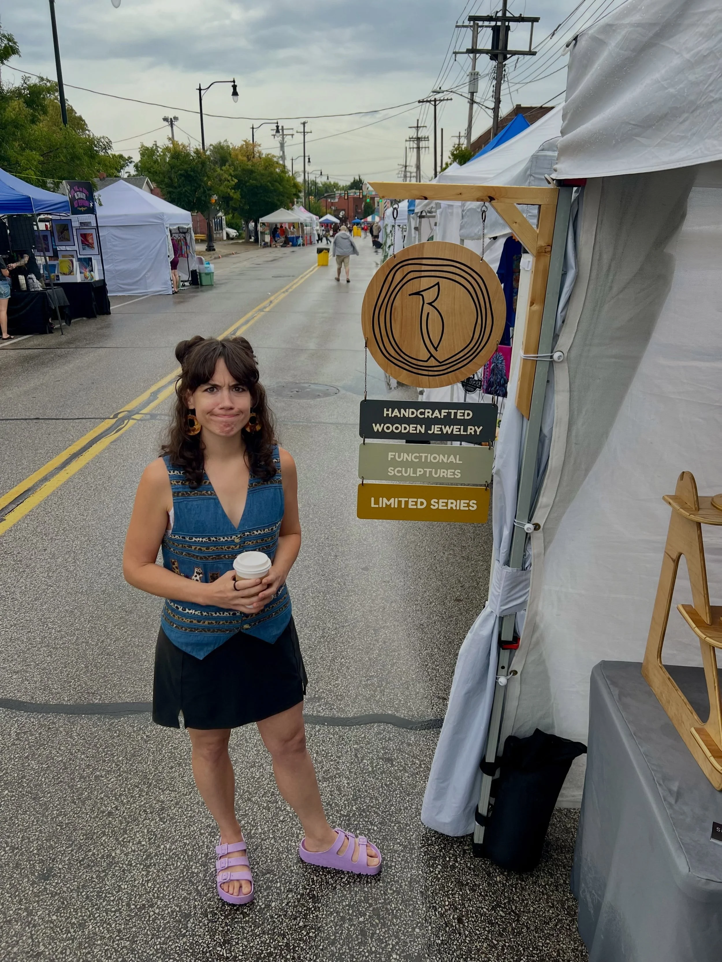 It&rsquo;s wet and wild here at Waterloo Arts Festival. We are here rain or shine from noon - 7:00 pm today. 🌦️

@waterlooarts 
#silvaticadesigns #waterlooartsdistrict #clevelandartist #woodjewelry
