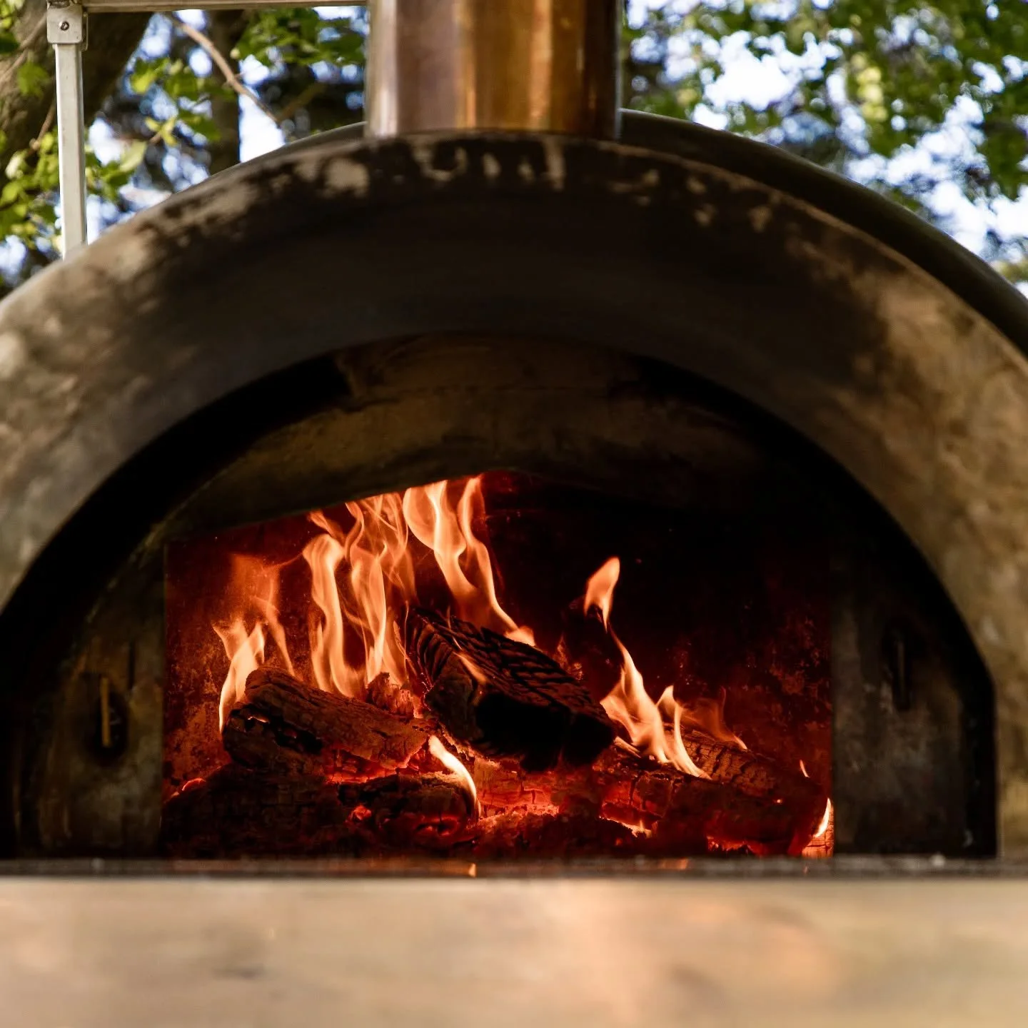 EXCLUSIVELY WOOD FIRED 🪵🍕🔥

Our pizzas are all exclusively fired in our wood fired pizza ovens, whether you are enjoying a catering at your event, visiting our farm or enjoying one of our frozen wood fired pizza at home! 

Our wood ovens are power