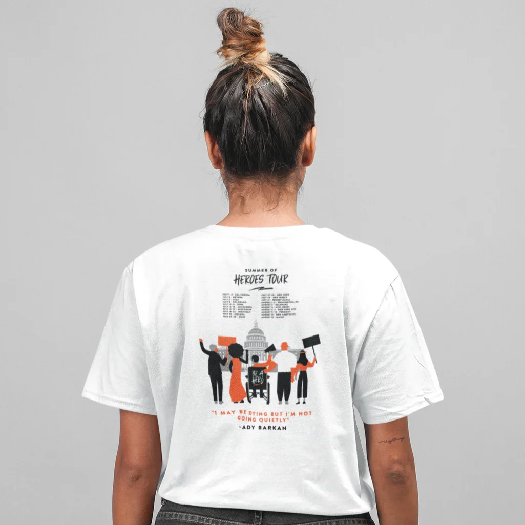 unisex-t-shirt-back-view-mockup-of-a-girl-facing-towards-seamless-paper-22776_1.webp