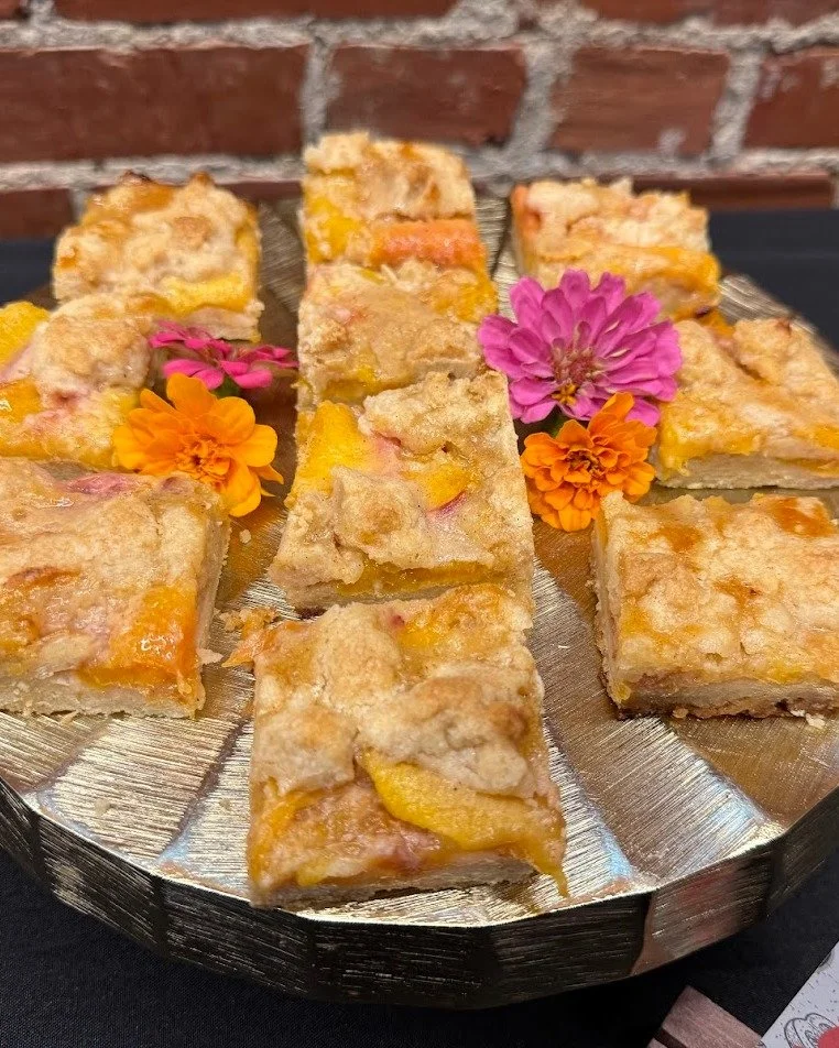 🍑✨ Sweet summertime in every bite! These peach pie bars were the perfect treat at a recent Farm to Fork catering event &mdash; buttery, fruity, and made with love. 💛

From savory bites to seasonal desserts, we love creating menus that celebrate the