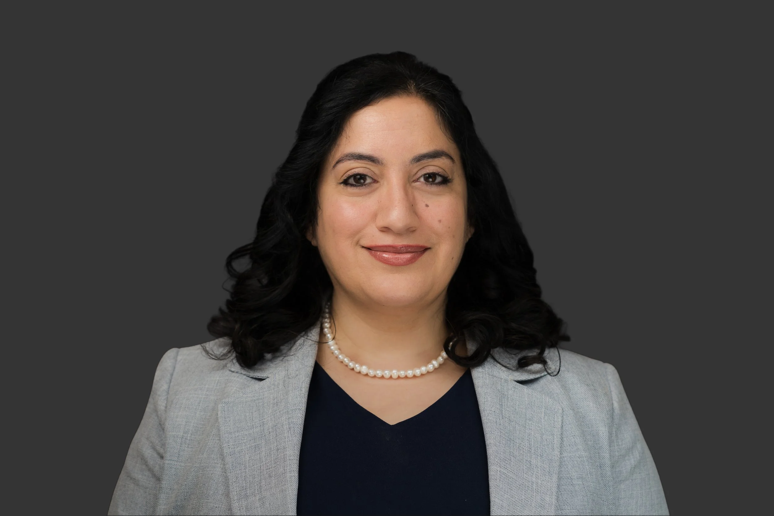 Headshot of Noosa A. Al-Sarraj, Associate at Deitch Law Offices.