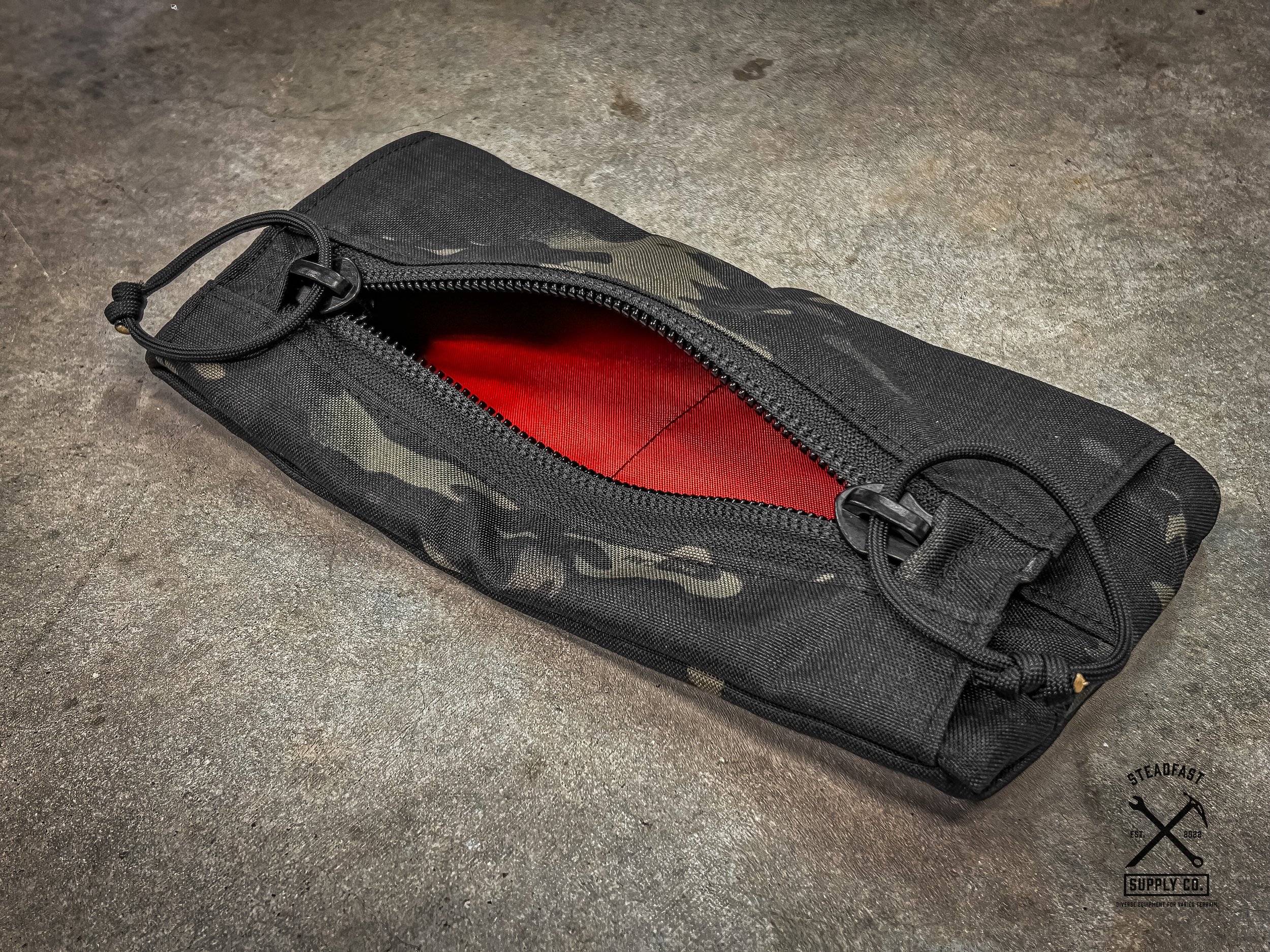 Multicam Black pocket with hi vis liner great for use in a every day carry backpack or in our tool roll. Velcro backed for convenient use in Hill People Gear Go Ruck or Carryology packs.