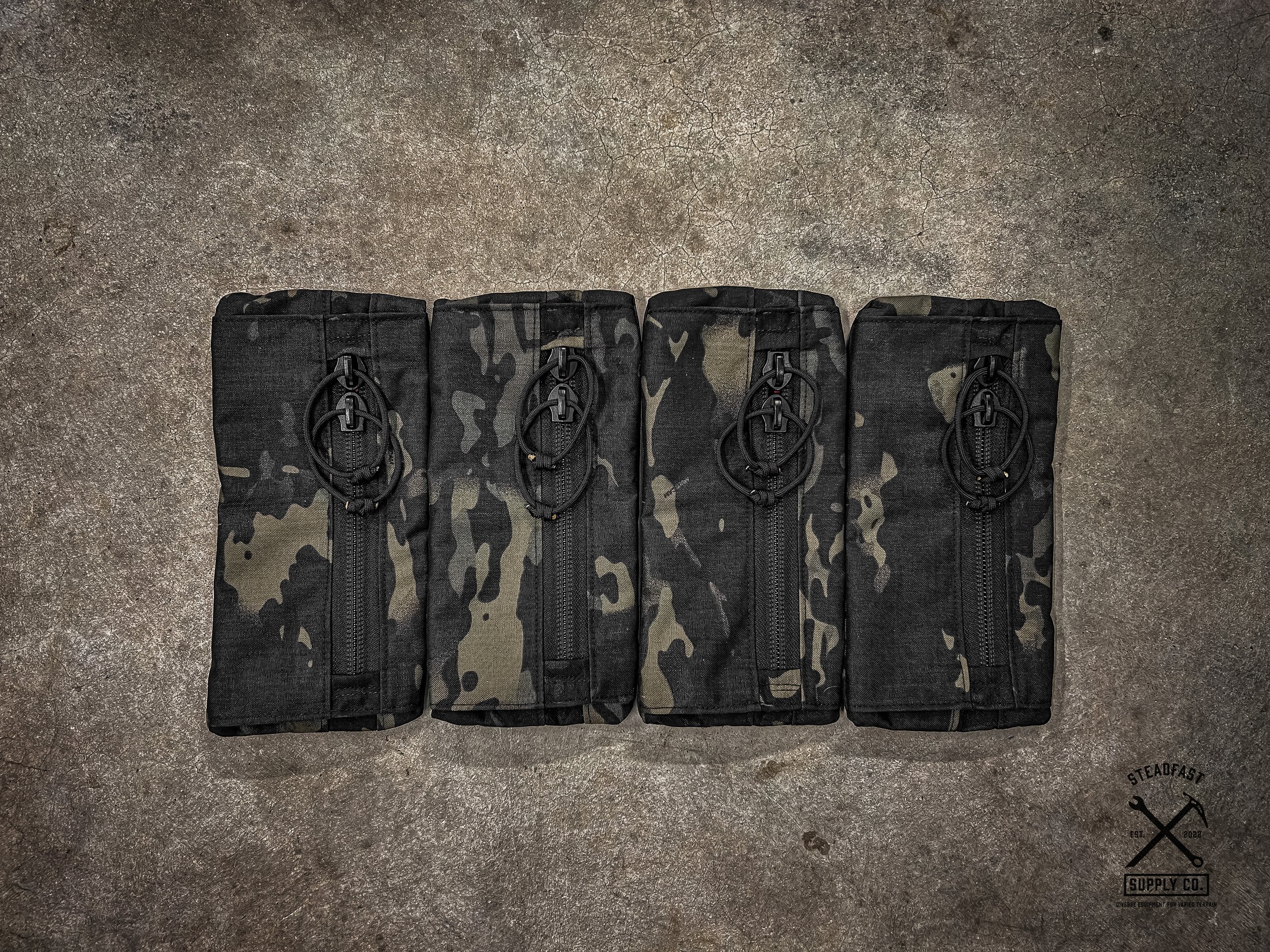 Multicam Black pocket with hi vis liner great for use in a every day carry backpack or in our tool roll. Velcro backed for convenient use in Hill People Gear Go Ruck or Carryology packs.
