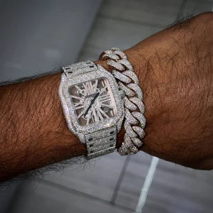 Skeleton face. Full bustdown. Cuban choking the wrist.