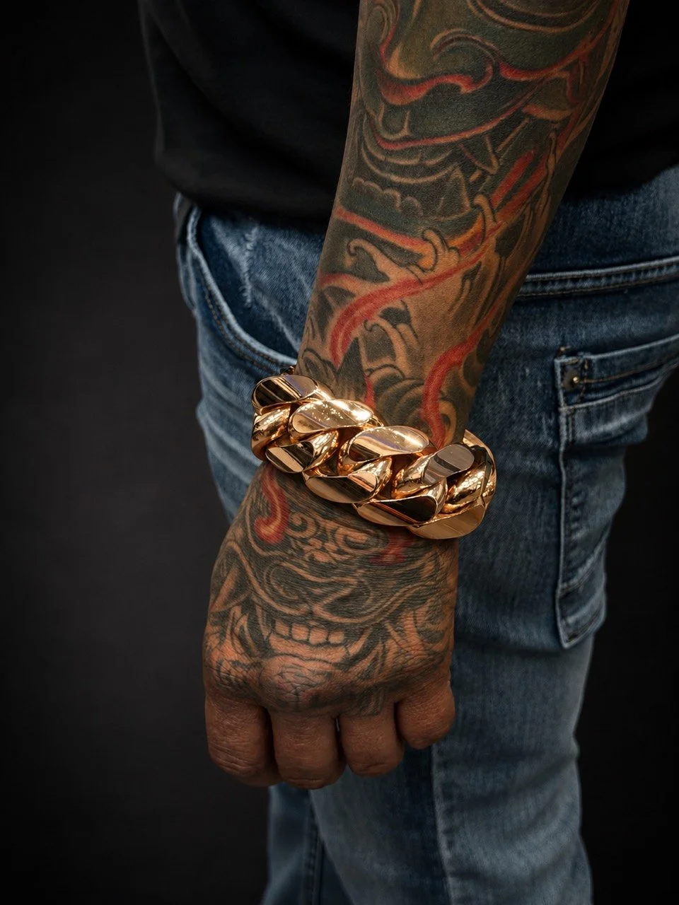 Heavy solid 10KT rose gold Miami Cuban bracelet, 758.3 grams and 35mm wide, shown on wrist at Gold N Diamonds Tampa