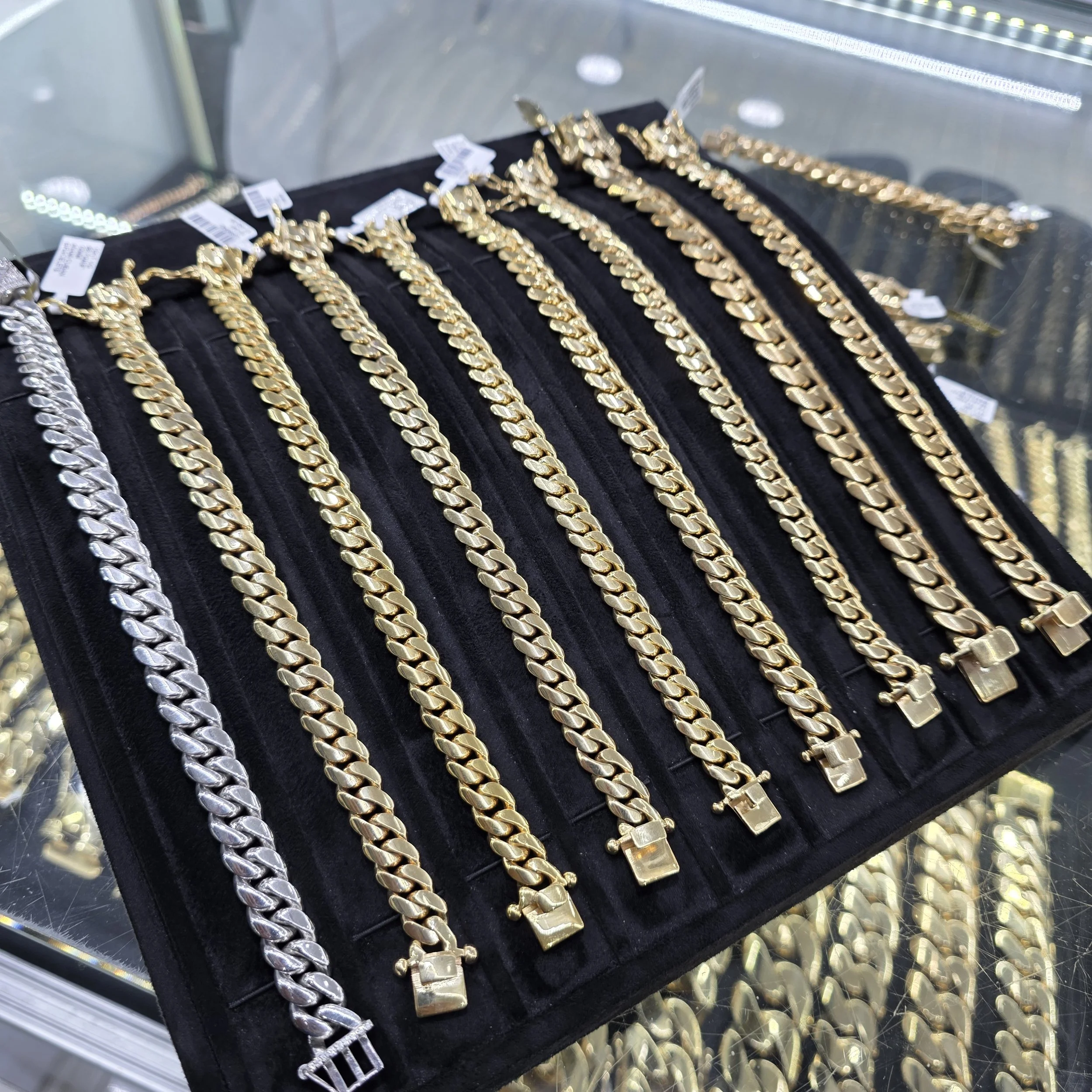 Solid gold Miami Cuban bracelets at Gold N Diamonds Tampa