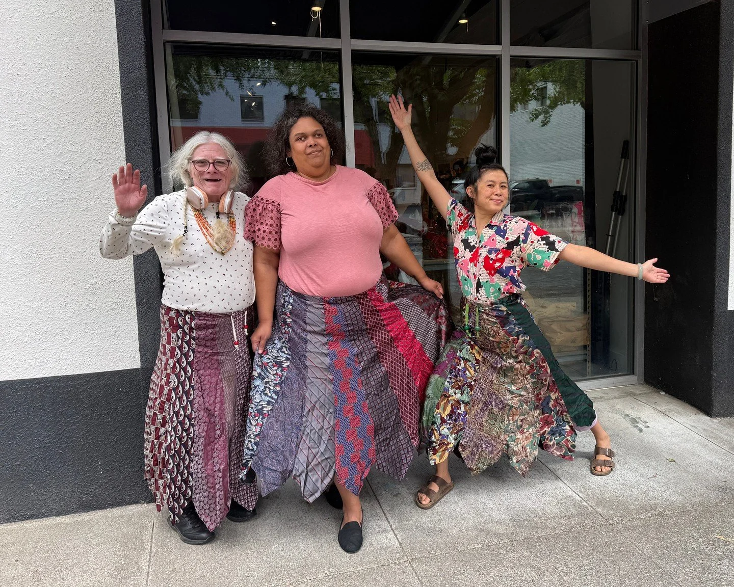 The fabulous Zenny handmade these skirts out of 100% silk ties and boy did we have fun modeling them! 

You can find these one-of-a-kind pieces in our current fiber arts group exhibition, LOOSE THREADS &amp; RAW EDGES, open through November 1, 2026! 