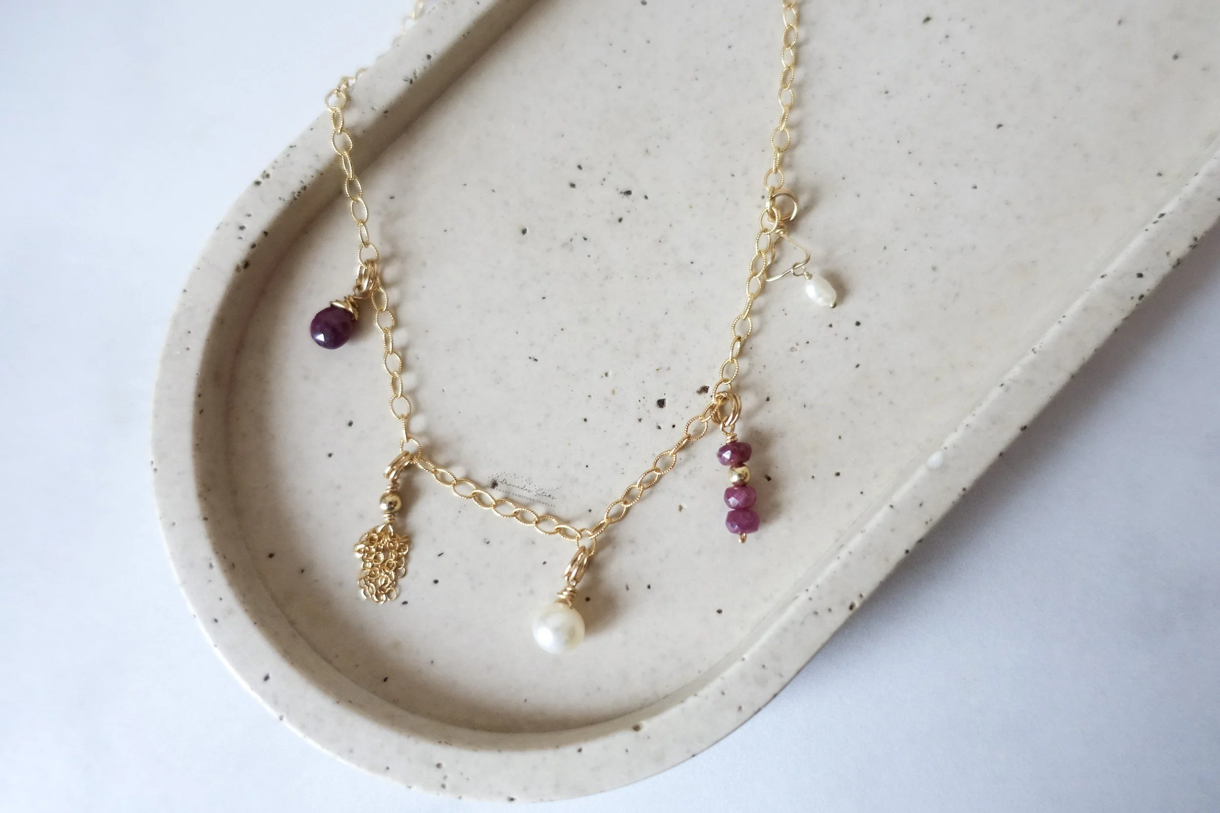 handmade charm necklace gf birds eye tray.jpg