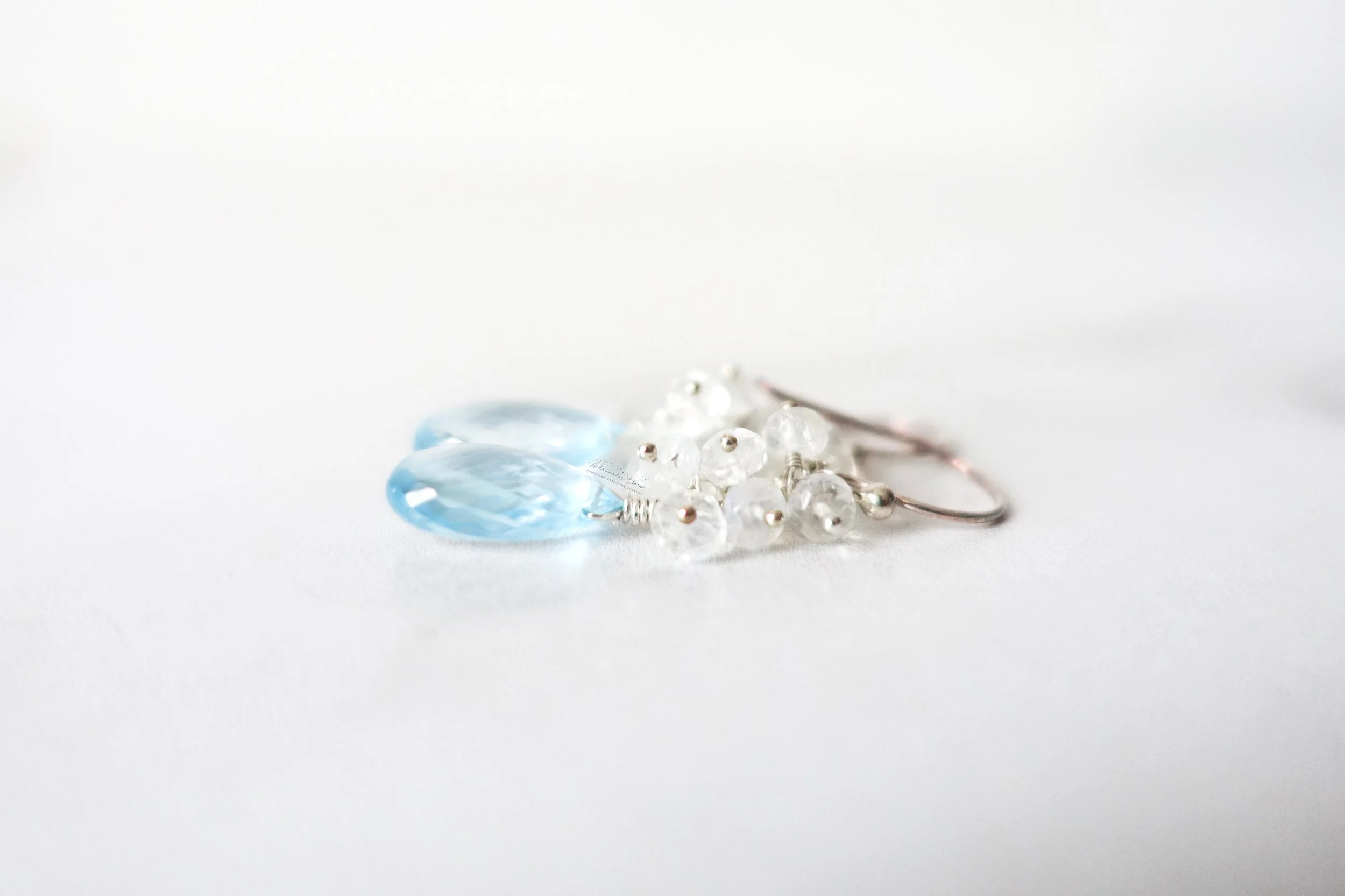 blue topaz earrings side view moonstone.jpg