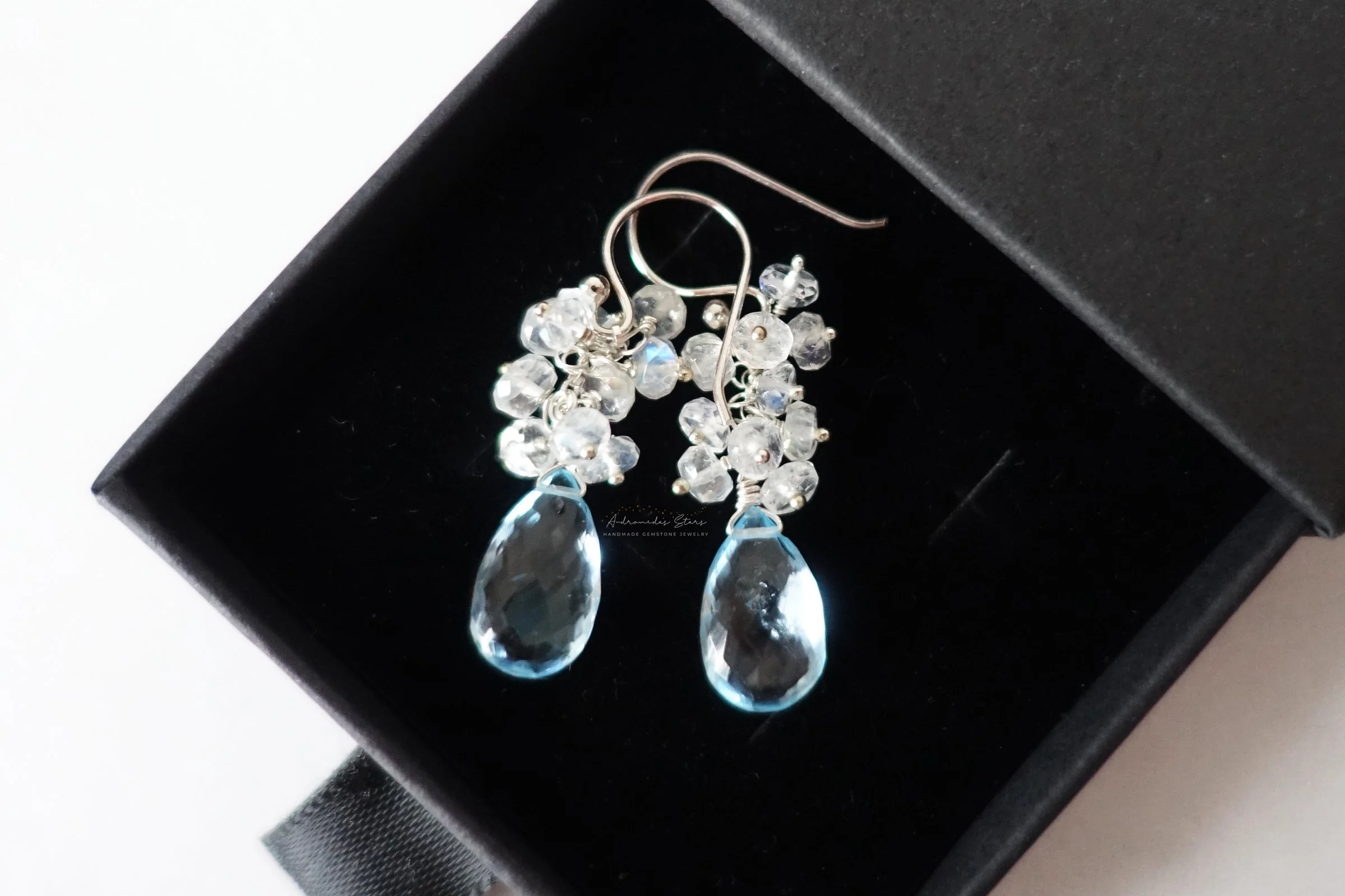 blue topaz earrings moonstone black box.jpg