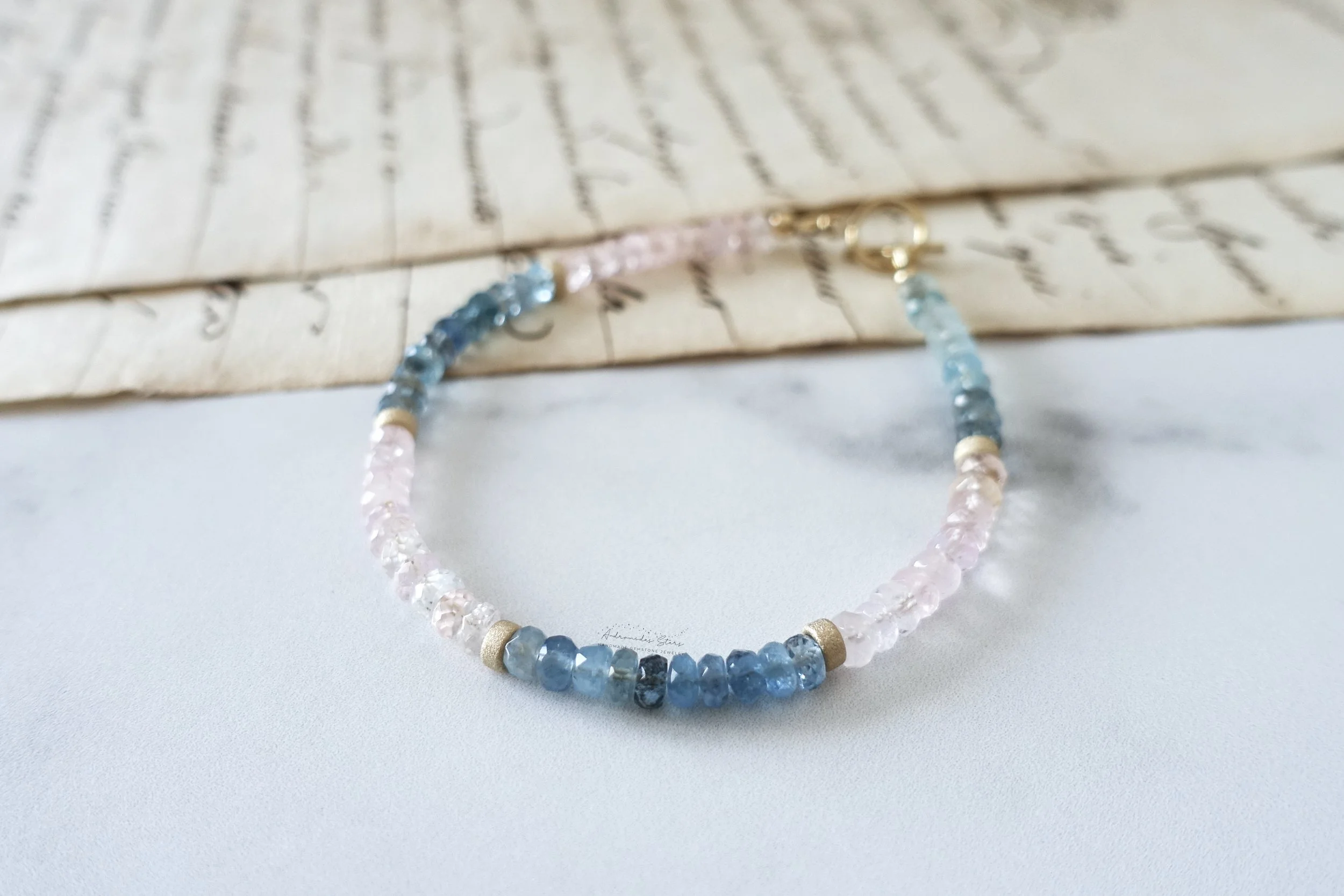 shaded aquamarine bracelet gold script.jpg