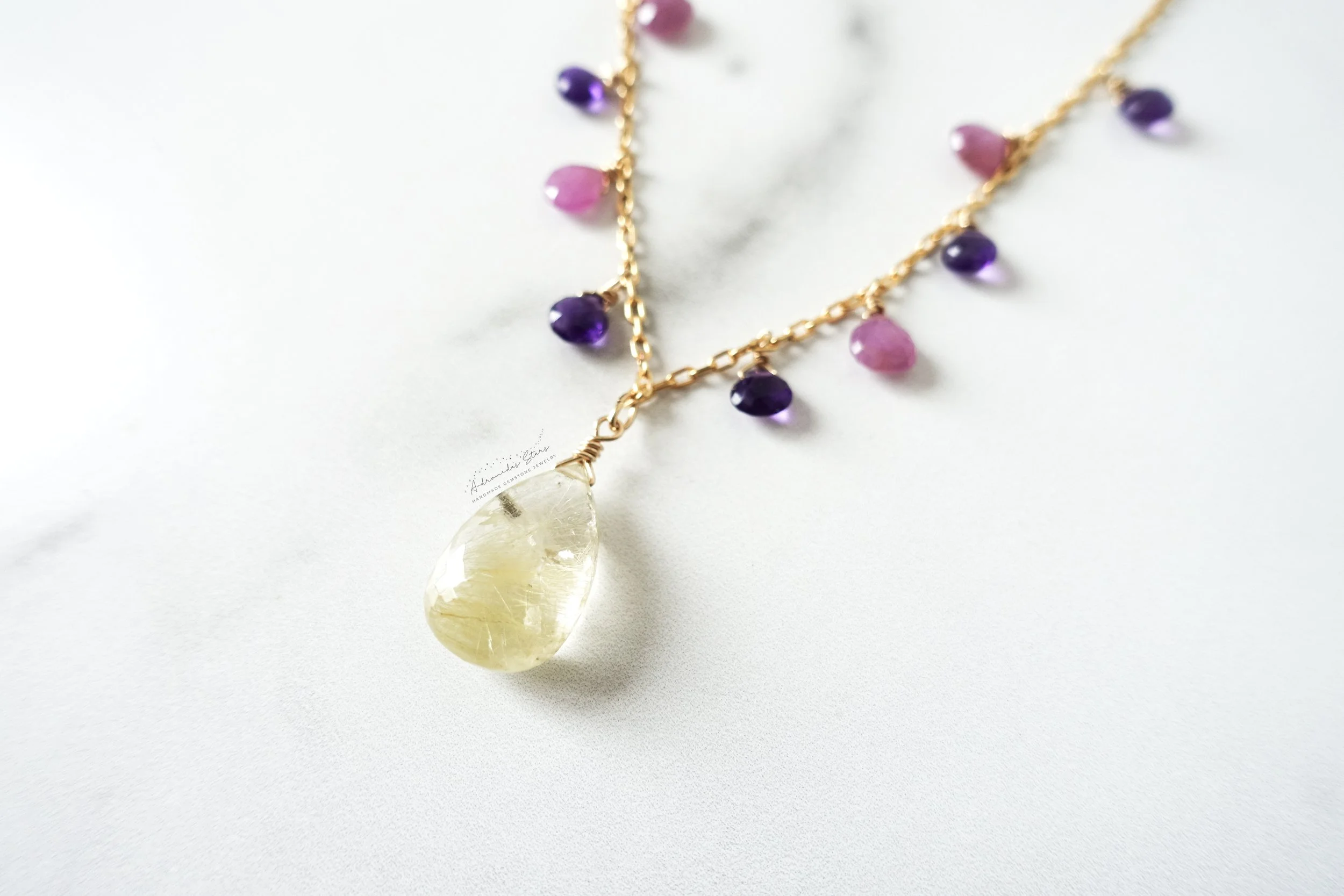 rutilated quartz necklace close up pendant.jpg