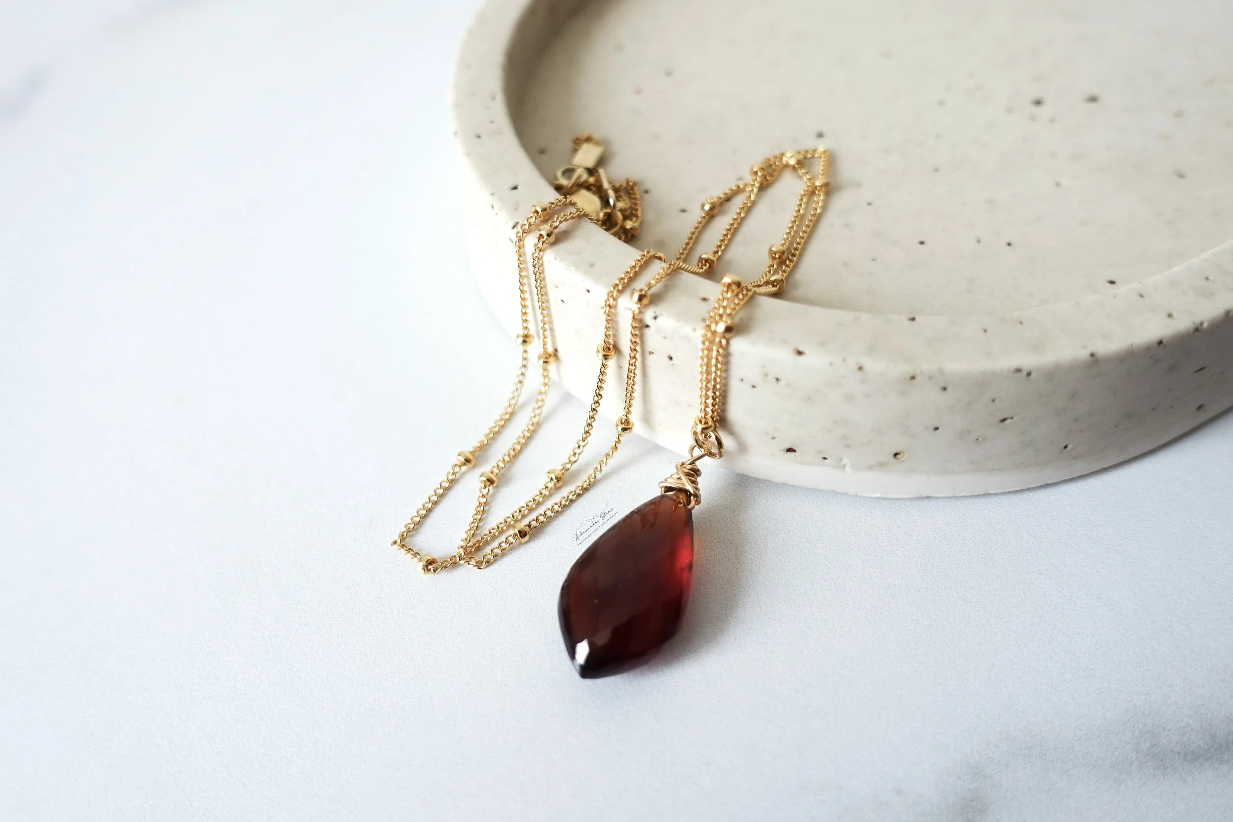garnet satellite necklace gf tray.jpg