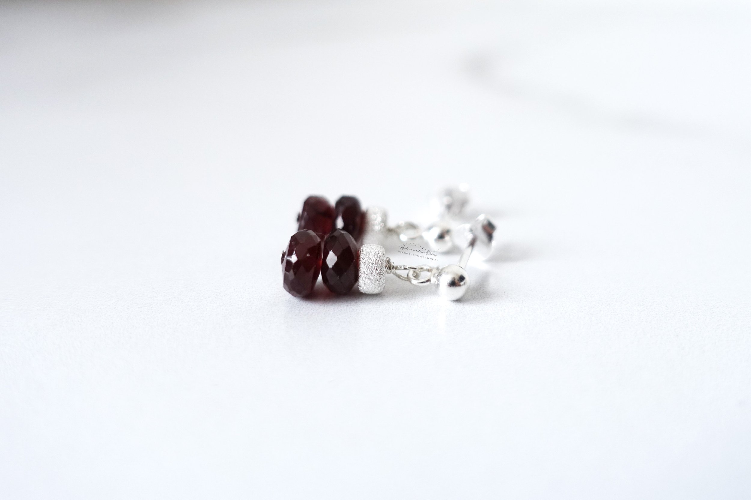 garnet drop earrings ss flat front view.jpg