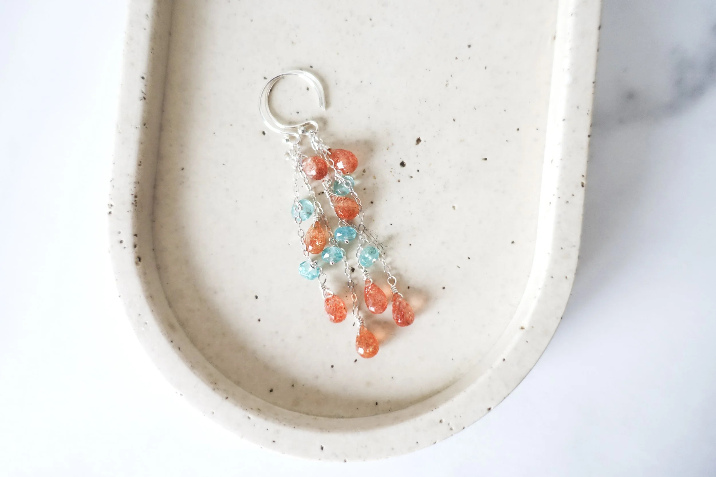 sunstone apatite dangle earrings birds eye tray.jpg